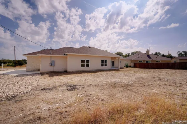 a view of a yard with an trees