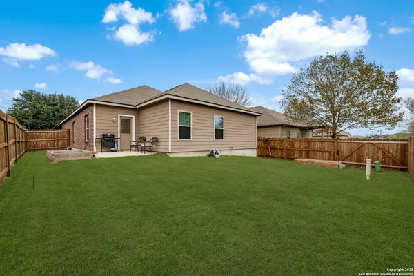 a view of a house with a big yard