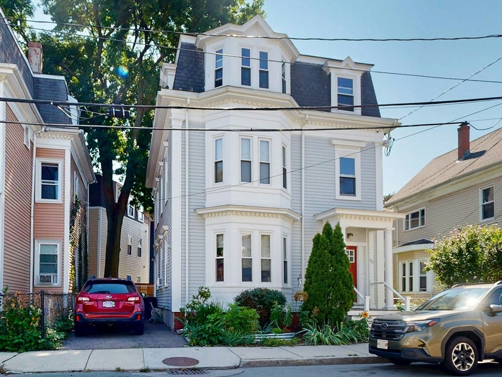 80 Newton Street, Unit 2 Somerville, MA 02143 - Photo 8 of 9 a car parked in front of a house
