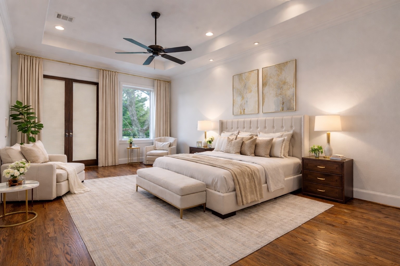 6520 Rodrigo Street Houston, TX 77007 - Photo 16 of 44 Spacious primary bedroom on the second floor featuring hardwood floors, tray ceiling, and private access to the balcony. Digitally staged.