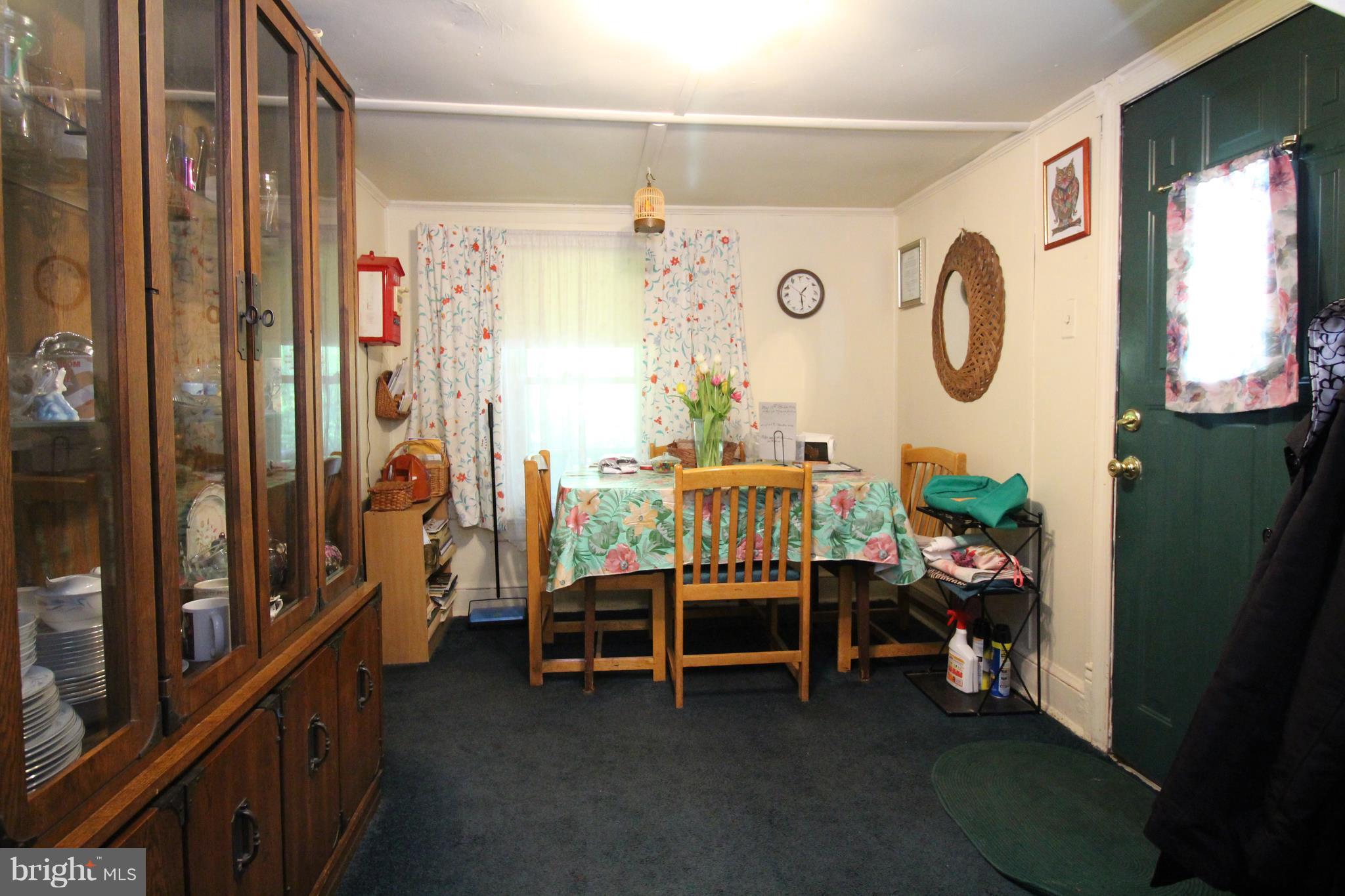 18511 Jerusalem Church Road Poolesville, MD 20837 - Photo 4 of 12 a bedroom with bunk bed and a window