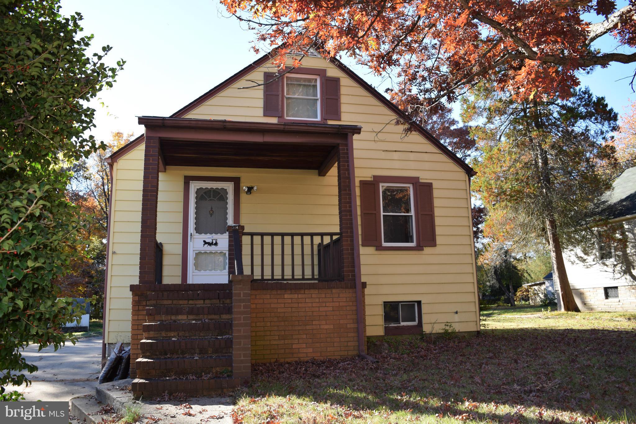 314 Worton Road Baltimore, MD 21221 - Photo 1 of 30 a front view of a house with a yard