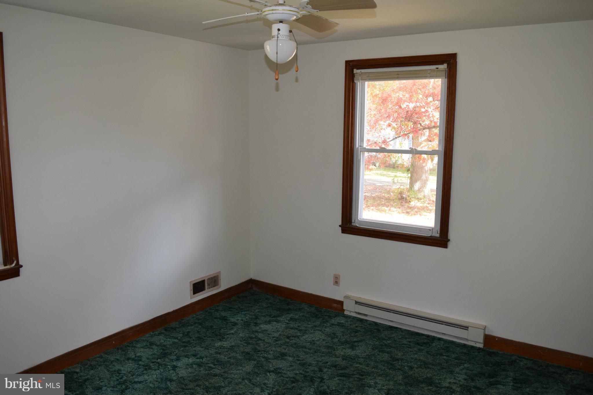314 Worton Road Baltimore, MD 21221 - Photo 11 of 30 an empty room with a window
