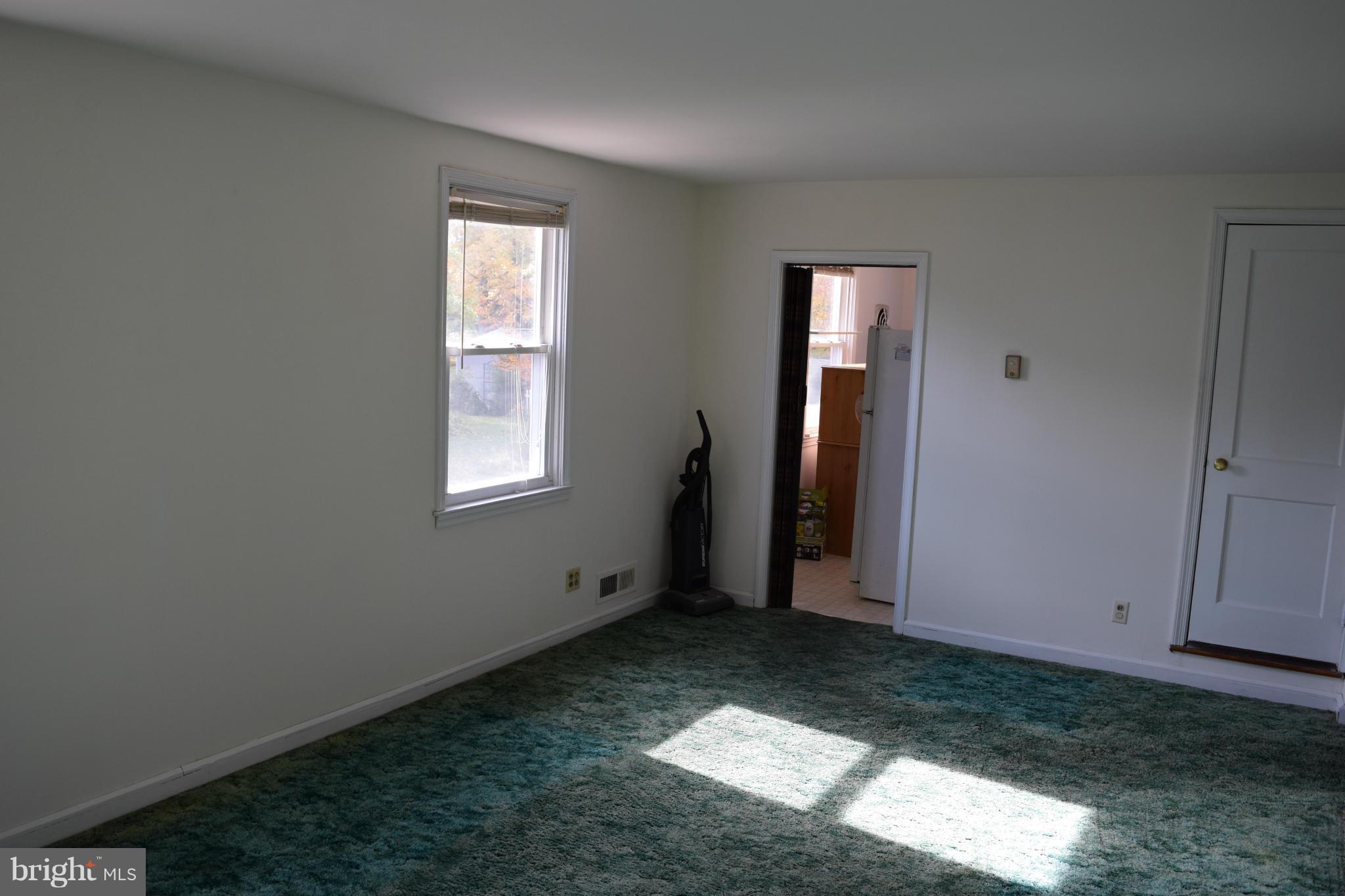 314 Worton Road Baltimore, MD 21221 - Photo 16 of 30 an empty room with windows