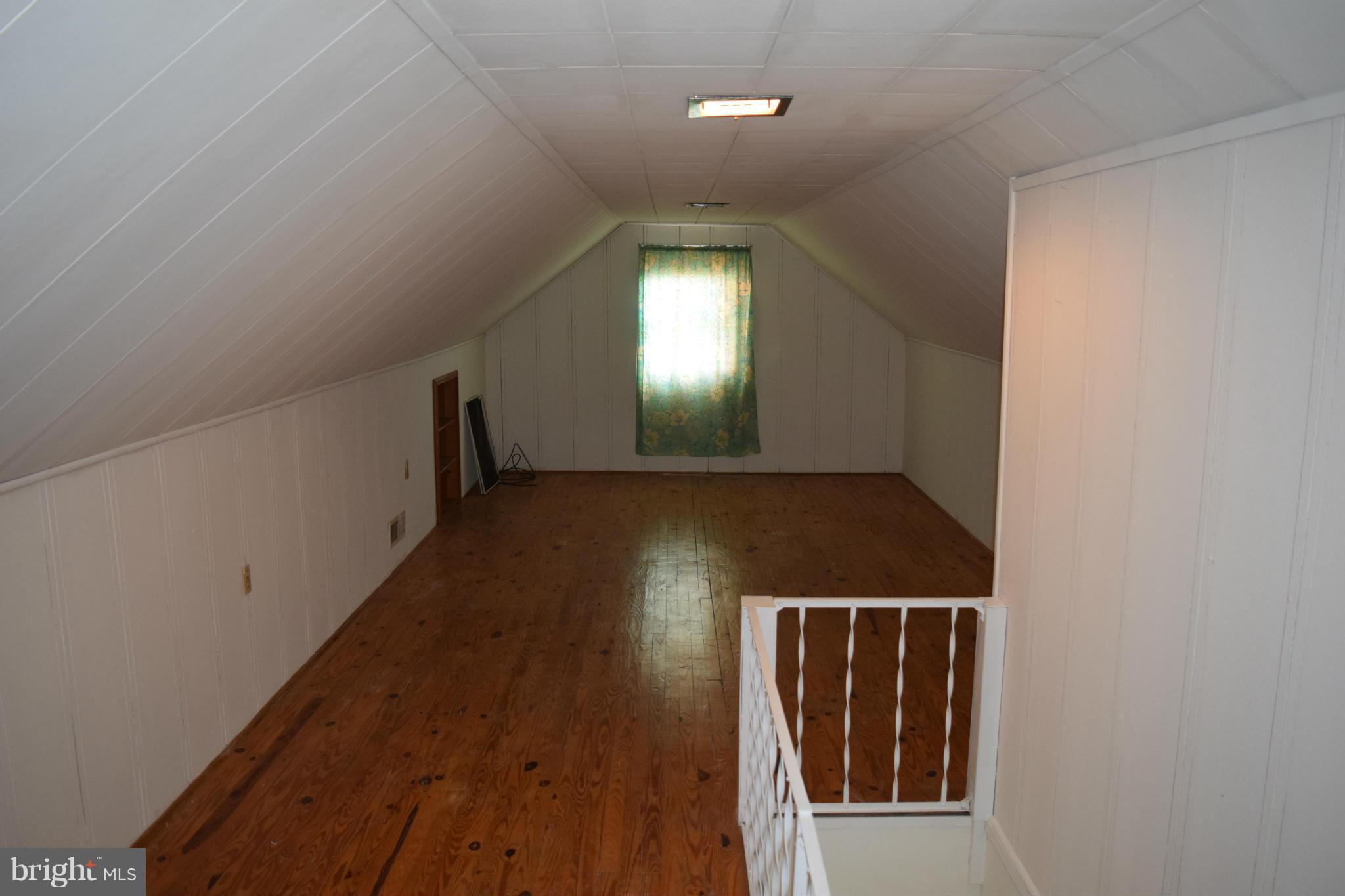 314 Worton Road Baltimore, MD 21221 - Photo 18 of 30 a view of a hallway with wooden floor