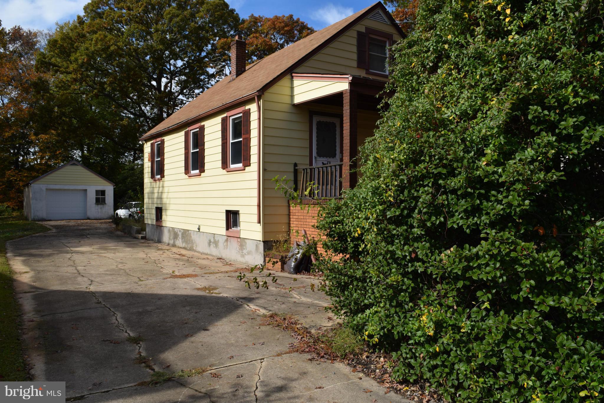 314 Worton Road Baltimore, MD 21221 - Photo 3 of 30 a white house that has a tree in front of it