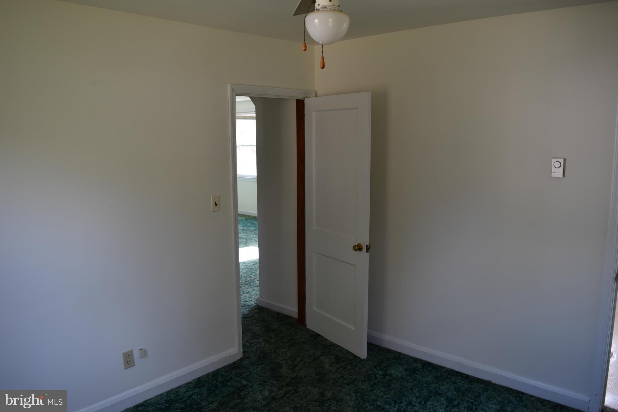 314 Worton Road Baltimore, MD 21221 - Photo 8 of 30 a view of a hallway with a small space
