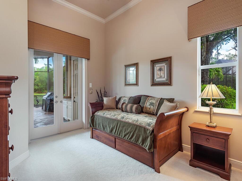 1749 Supreme Court Naples, FL 34110 - Photo 11 of 18 a living room with furniture and a window