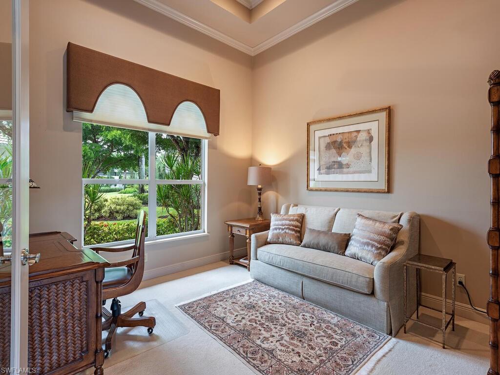 1749 Supreme Court Naples, FL 34110 - Photo 13 of 18 a living room with furniture and a window