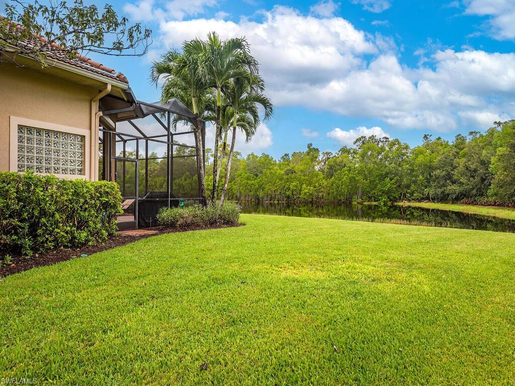 1749 Supreme Court Naples, FL 34110 - Photo 17 of 18 a view of a garden