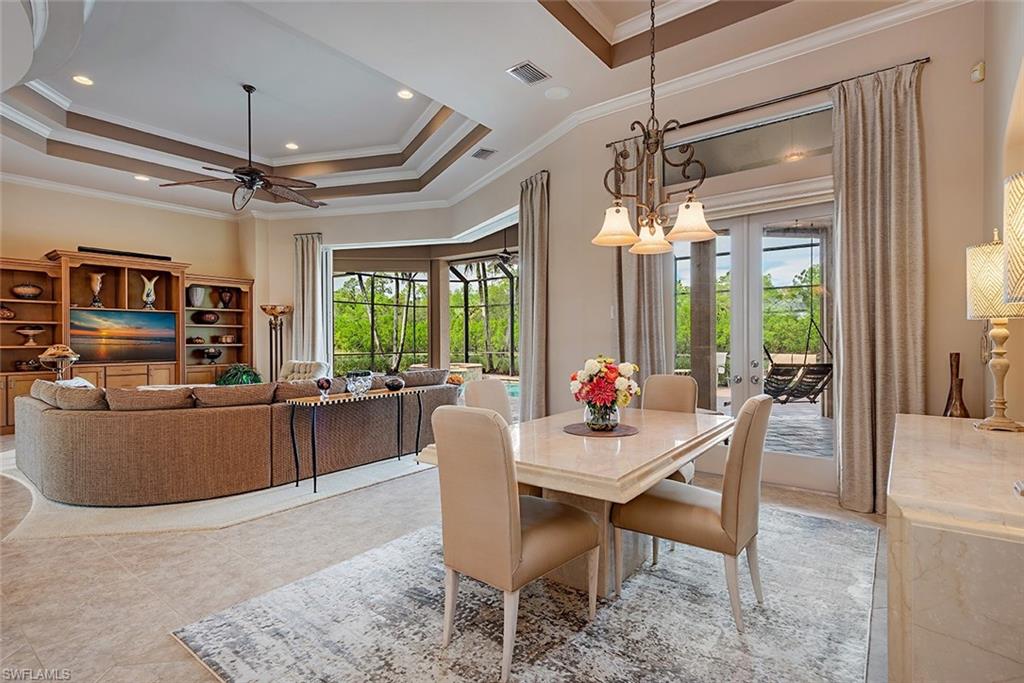 1749 Supreme Court Naples, FL 34110 - Photo 6 of 18 a view of a dining room with furniture window and outside view