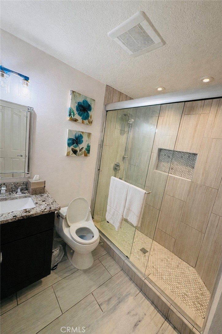 8215 East White Oak Ridge, Unit 77 Orange, CA 92869 - Photo 7 of 32 bathroom dowstairs