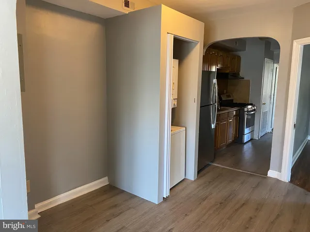 a view of a kitchen with a refrigerator