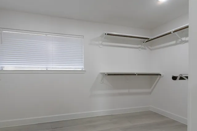 a view of an empty walk in closet