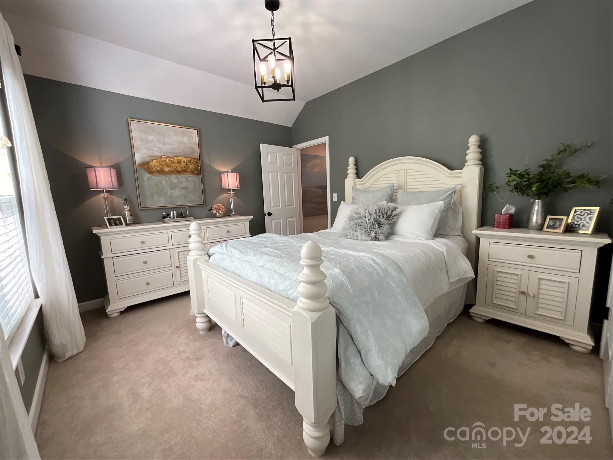 8126 Evanston Falls Road Huntersville, NC 28078 - Photo 29 of 42 a bedroom with bed and window