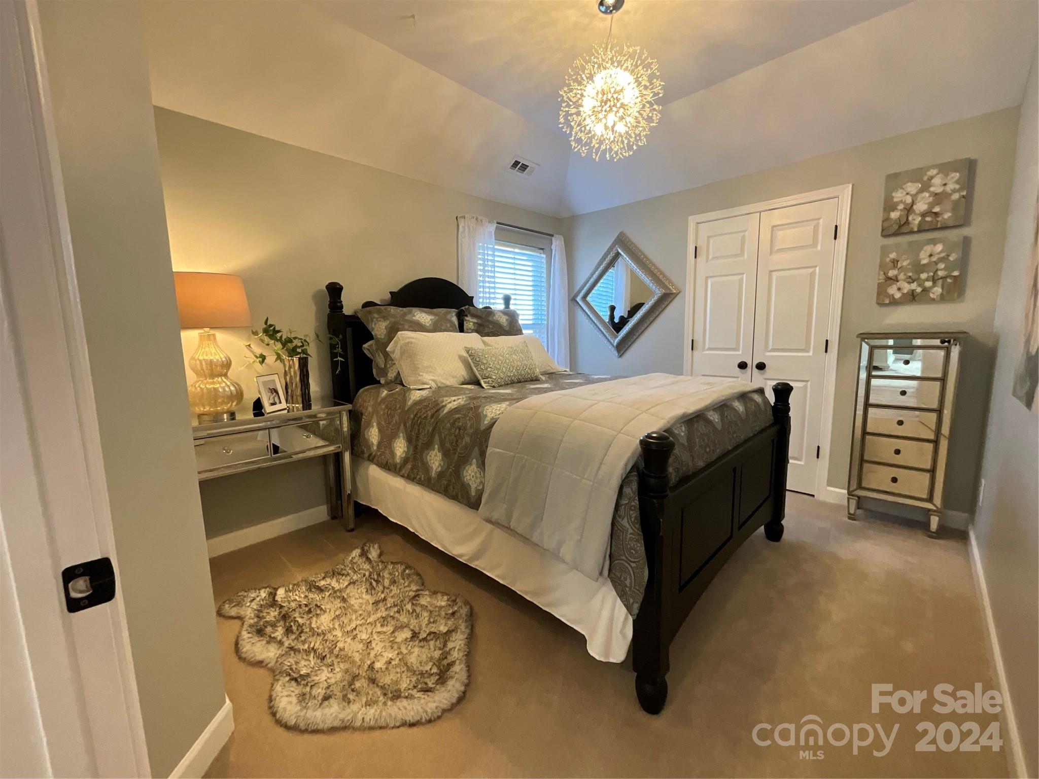 8126 Evanston Falls Road Huntersville, NC 28078 - Photo 30 of 42 a bed room with a bed and a window