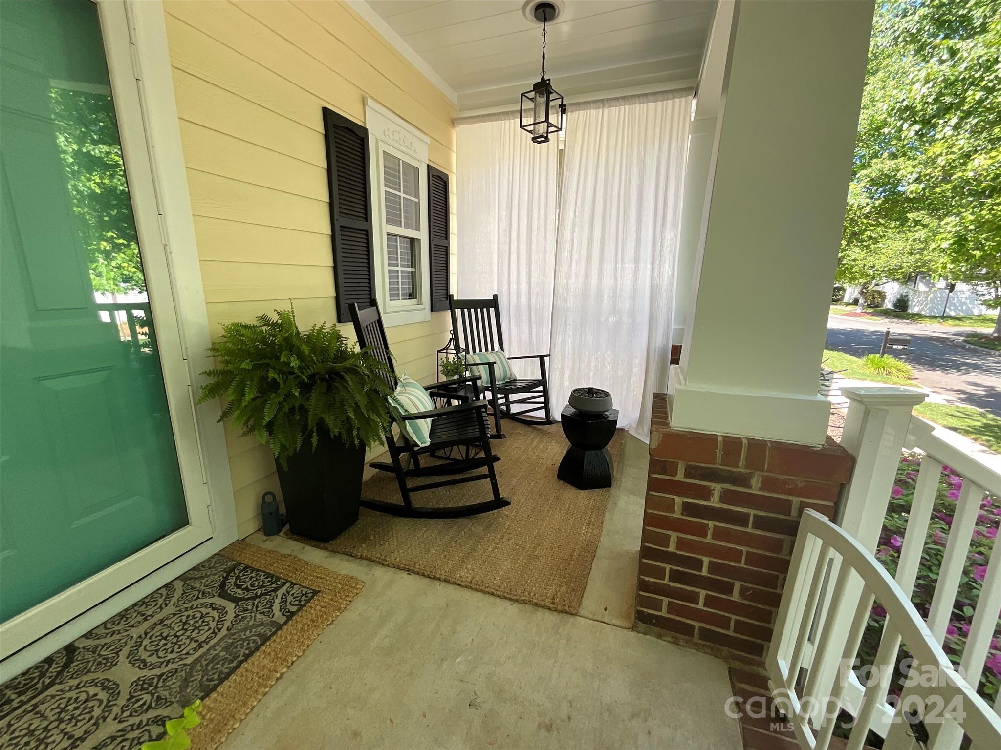 8126 Evanston Falls Road Huntersville, NC 28078 - Photo 4 of 42 a view of a entryway door of the house