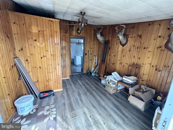 a bathroom with a window and a shower