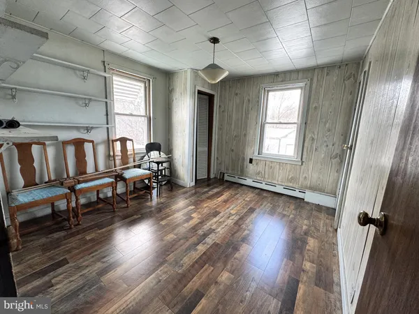 a view of livingroom with furniture window and wooden floor