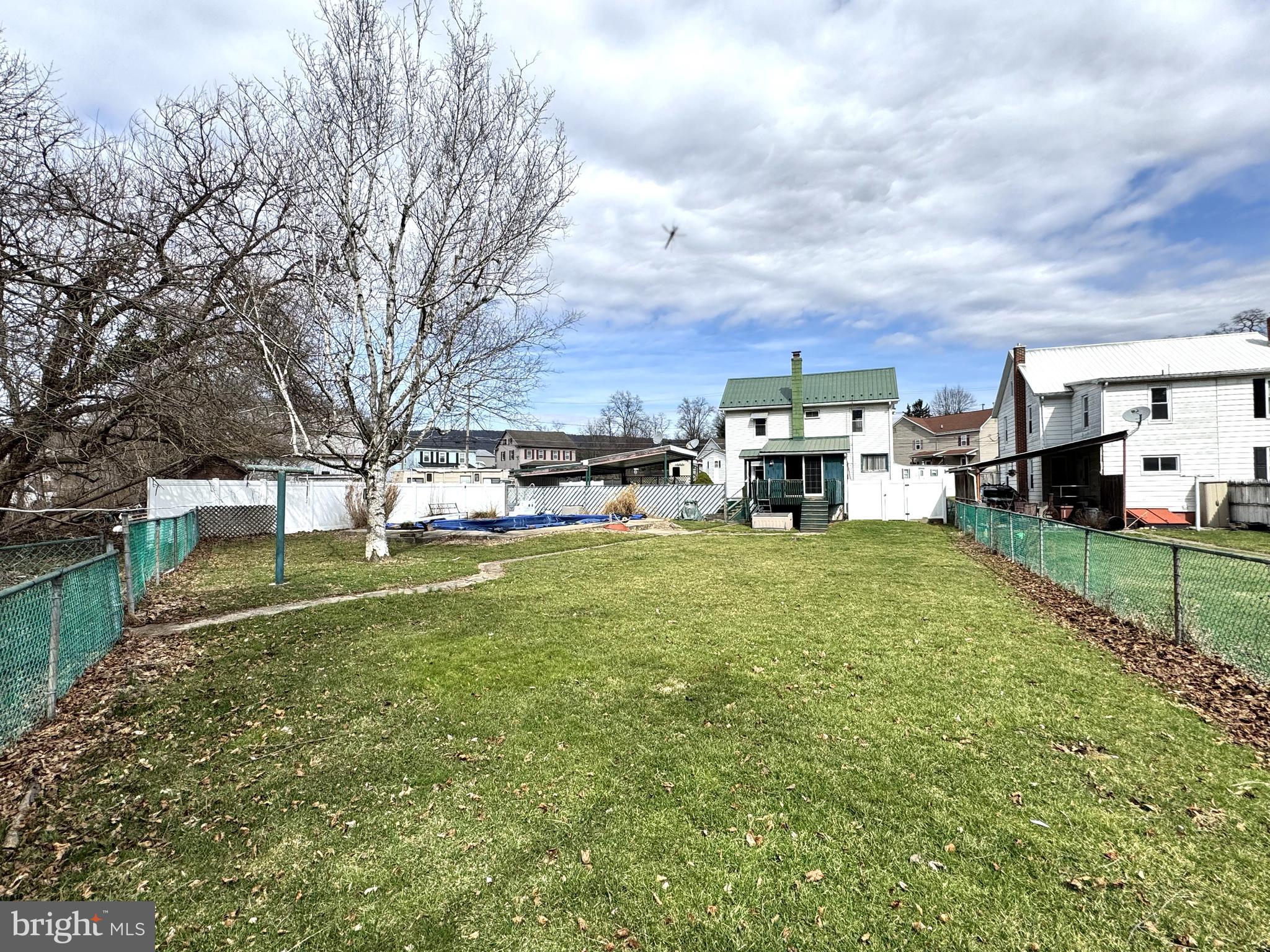 12 Maclay Street Milroy, PA 17063 - Photo 23 of 25 a view of a house with a big yard plants and large trees