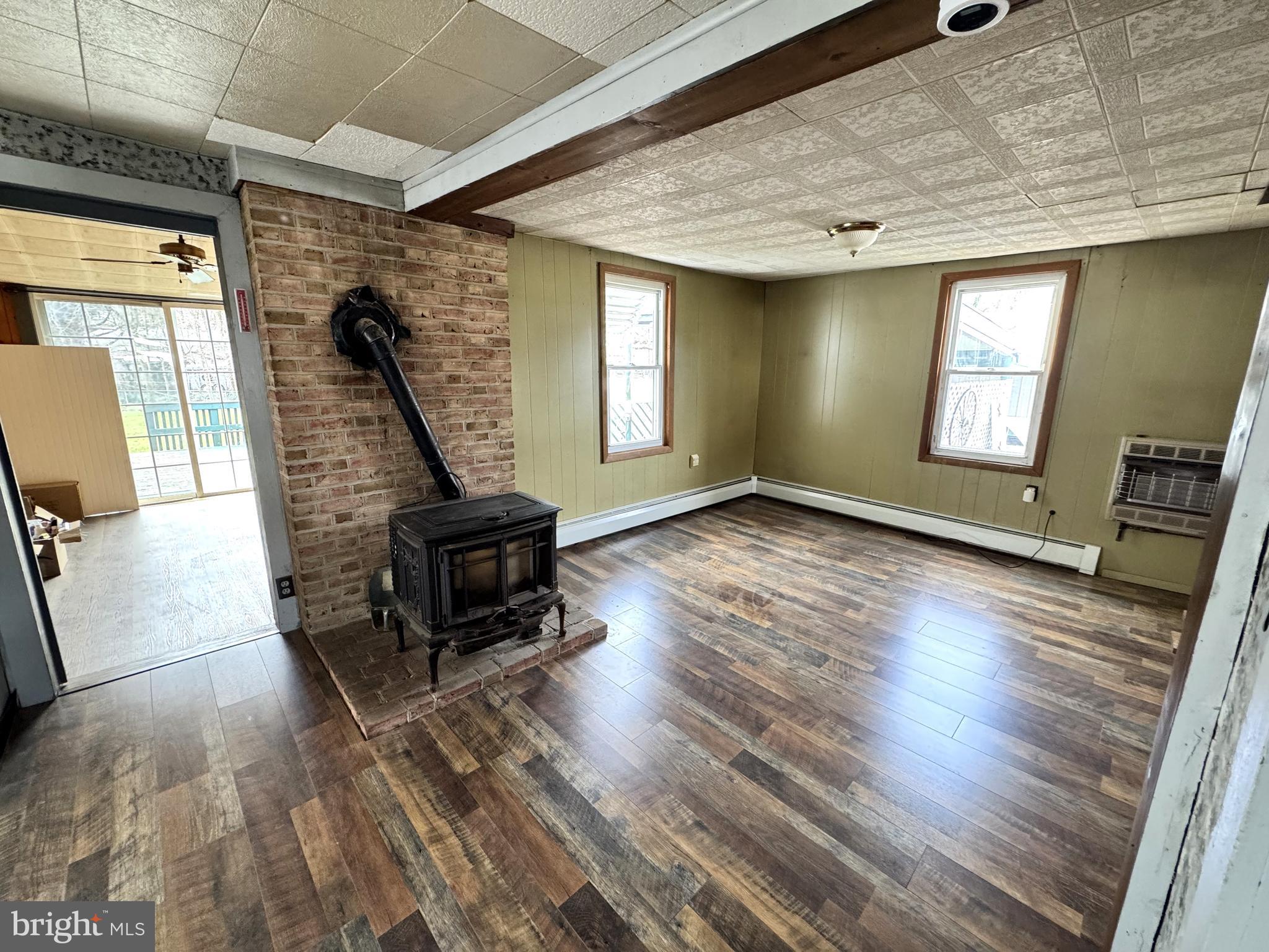 12 Maclay Street Milroy, PA 17063 - Photo 6 of 25 a living room with furniture and a wooden floor