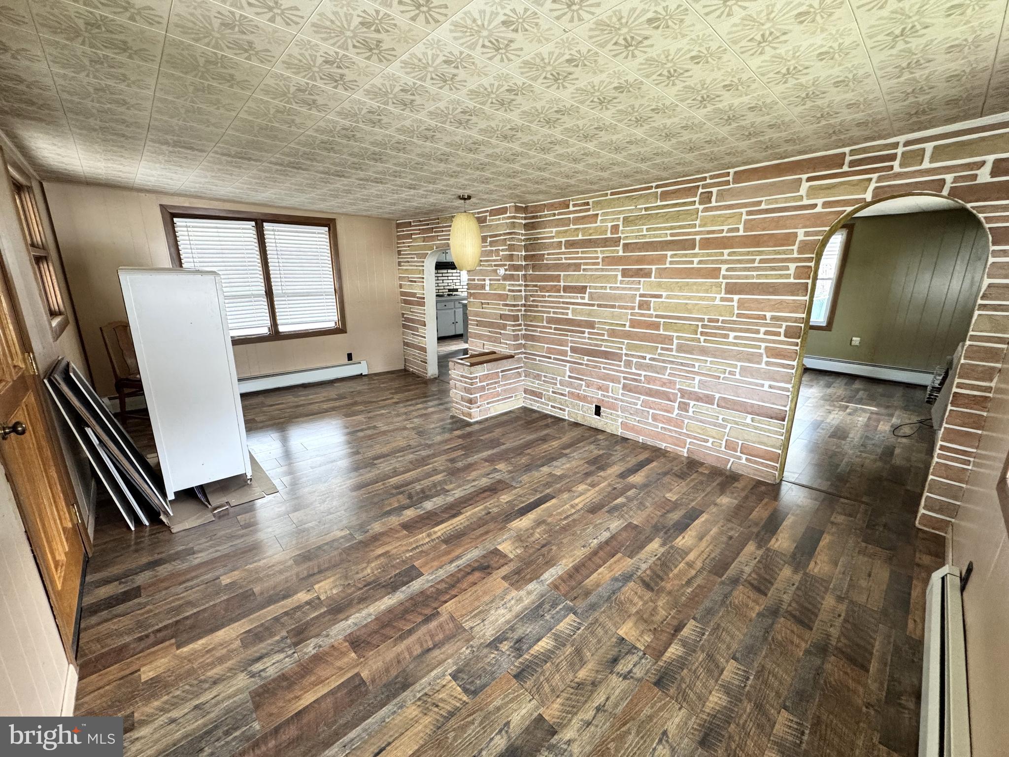 12 Maclay Street Milroy, PA 17063 - Photo 9 of 25 a view of empty room with wooden floor