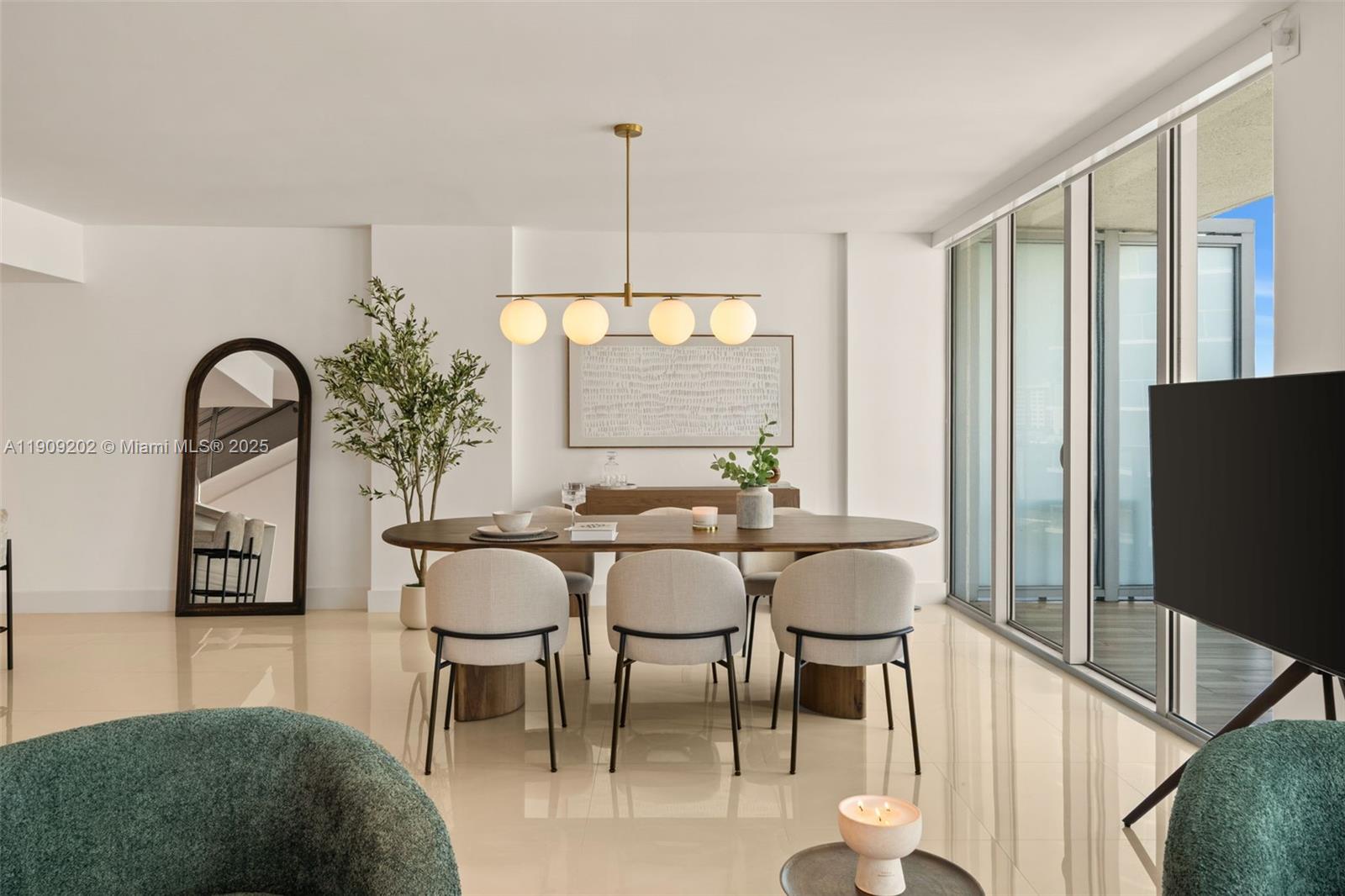6620 Indian Creek Drive, Unit 713 Miami Beach, FL 33141 - Photo 11 of 39 a view of a dining room with furniture window and outside view
