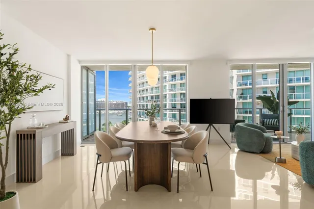 a view of a dining room with furniture window and outside view