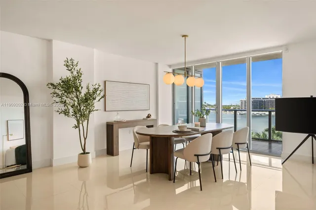 a view of a dining room with furniture window and outside view