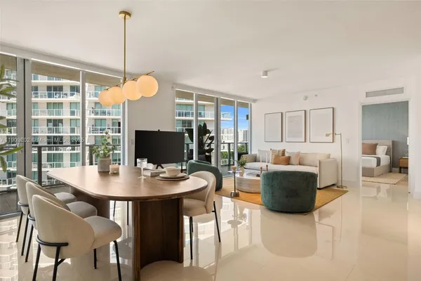 a view of a dining room with furniture