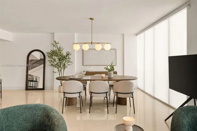 a view of a dining room with furniture window and outside view