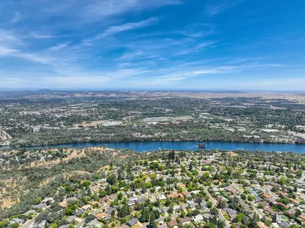 an aerial view of residential building and lake view