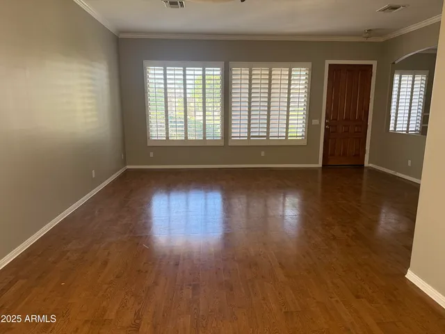 a view of a livingroom with a black and white walls