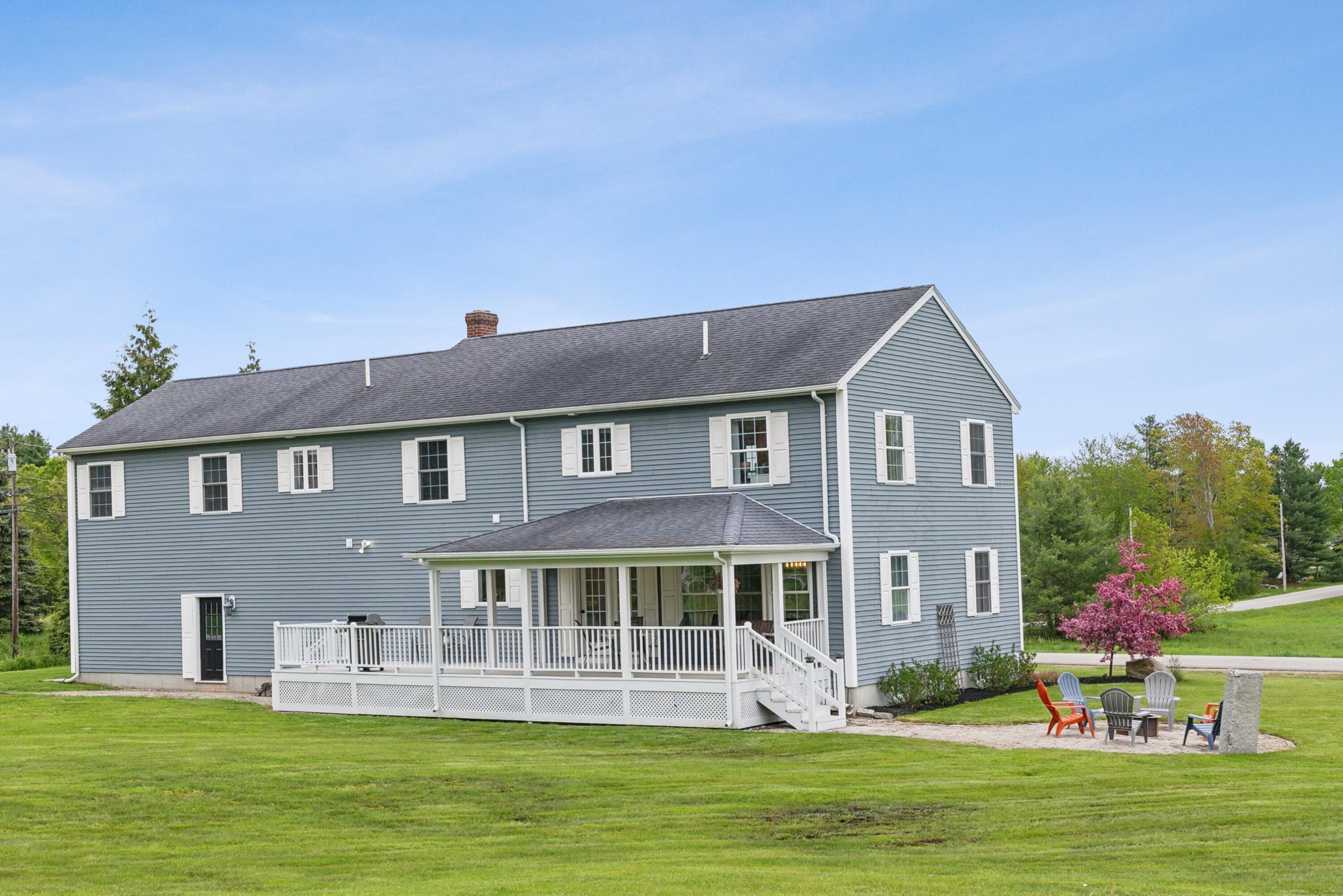 4 Tamrox Drive Arundel, ME 04046 - Photo 2 of 53 Rear Covered Porch and Deck with Firepit