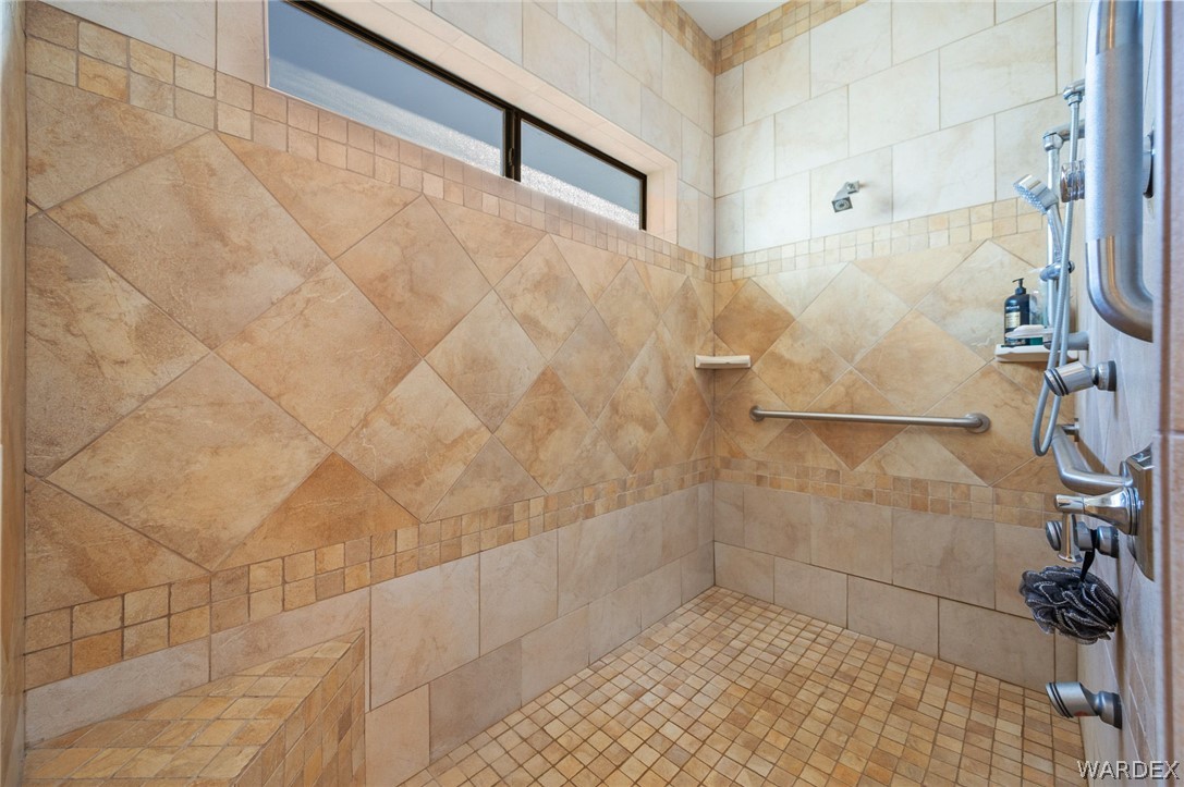 5840 North Cedar Ridge Lane Kingman, AZ 86409 - Photo 40 of 89 a bathroom with a shower