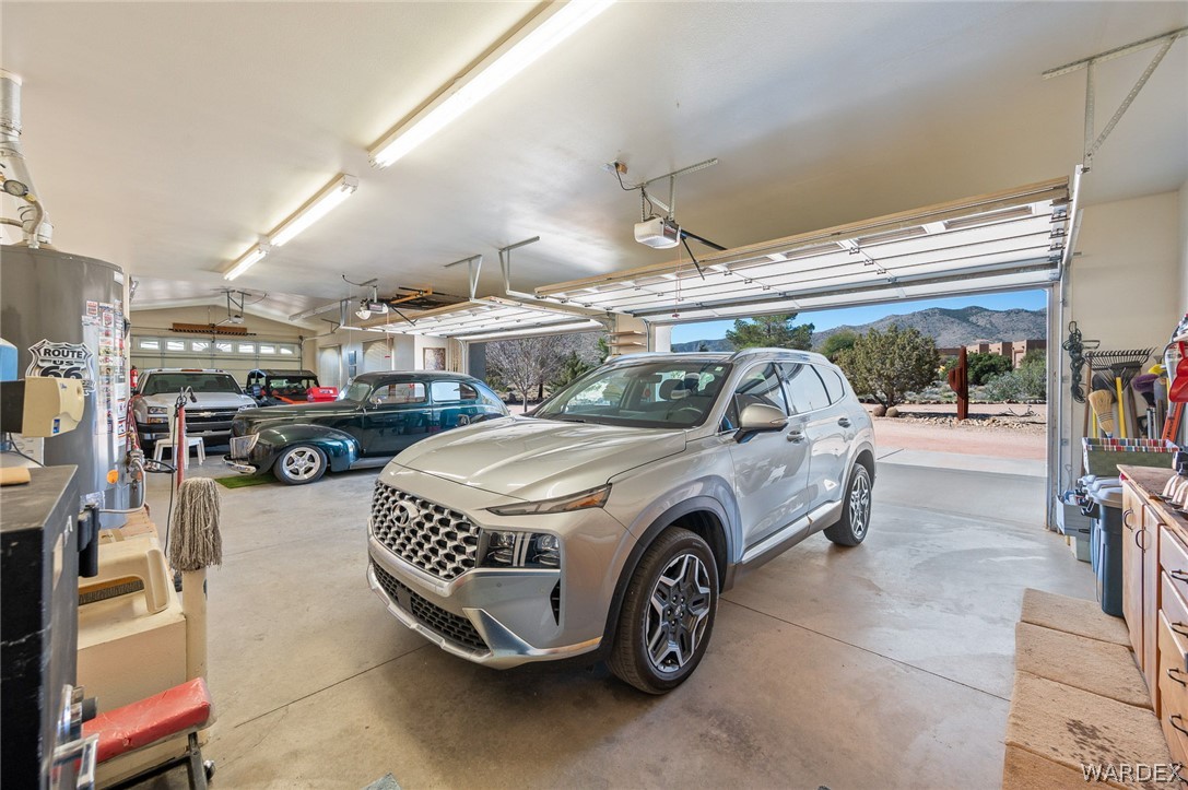 5840 North Cedar Ridge Lane Kingman, AZ 86409 - Photo 65 of 89 a car that is parked in a parking garage
