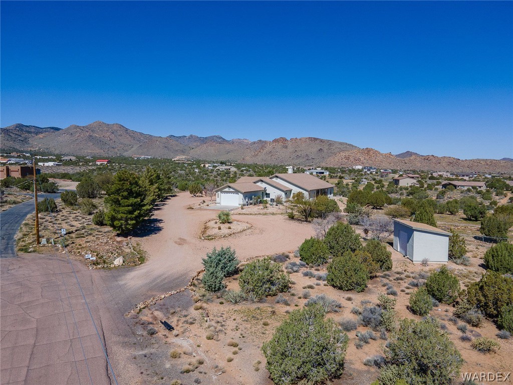 5840 North Cedar Ridge Lane Kingman, AZ 86409 - Photo 76 of 89 a view of a lake with a mountain