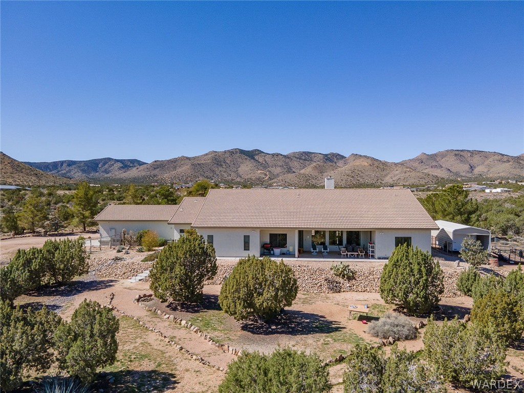 5840 North Cedar Ridge Lane Kingman, AZ 86409 - Photo 82 of 89 front view of a house with a yard