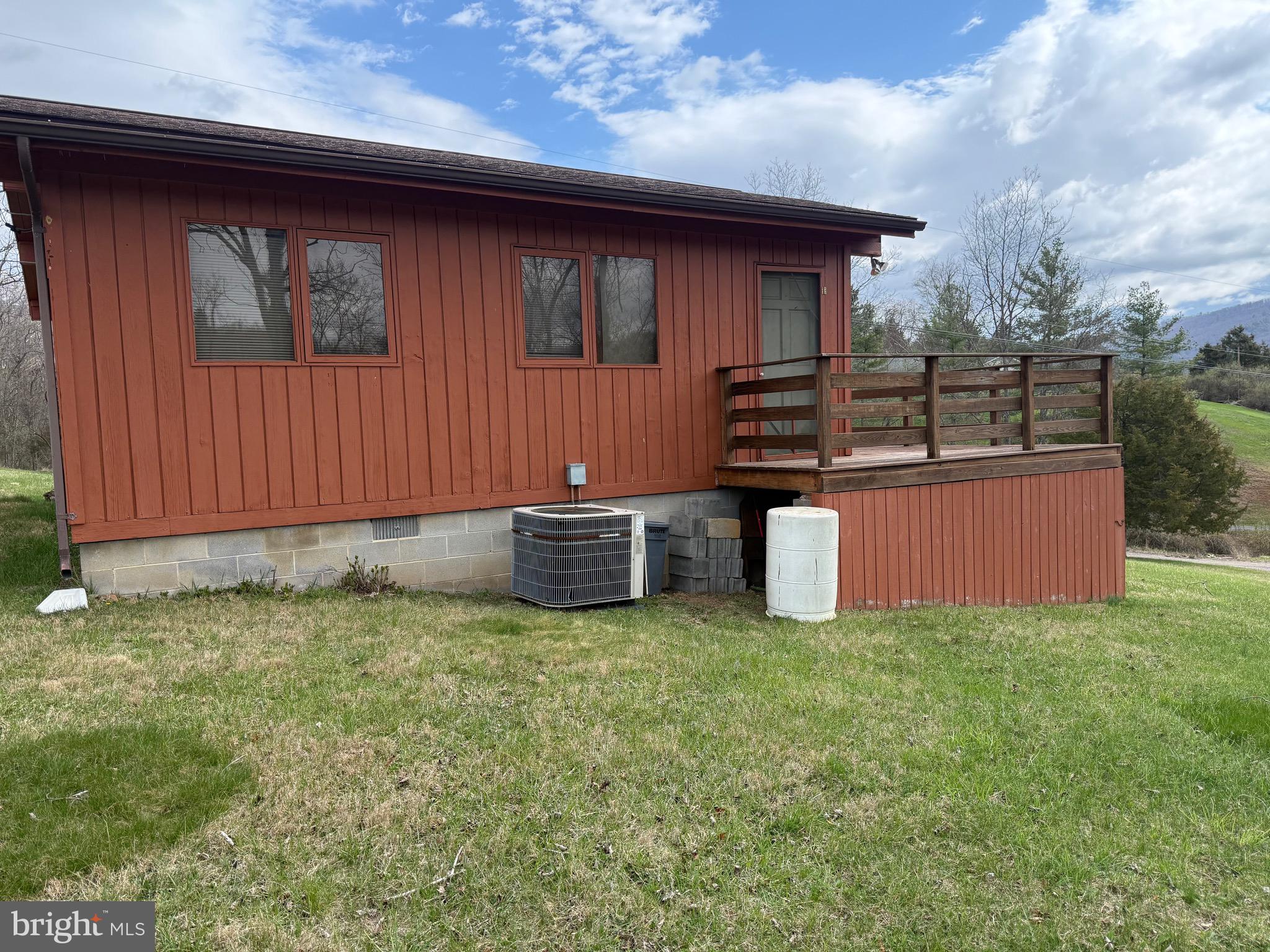 27 Hummingbird Heights Franklin, WV 26807 - Photo 3 of 12 a view of a backyard with wooden fence and a bench