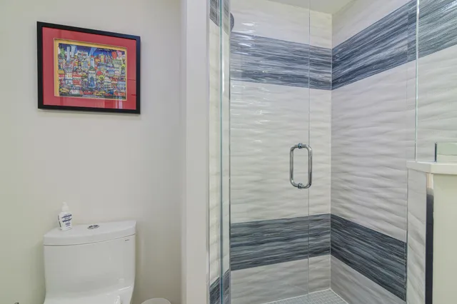 a bathroom with a sink vanity and a mirror