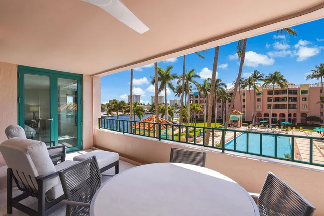 a view of a city with lawn chairs