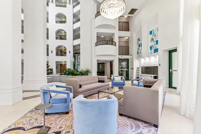 an aerial view of a house with a swimming pool yard and outdoor seating