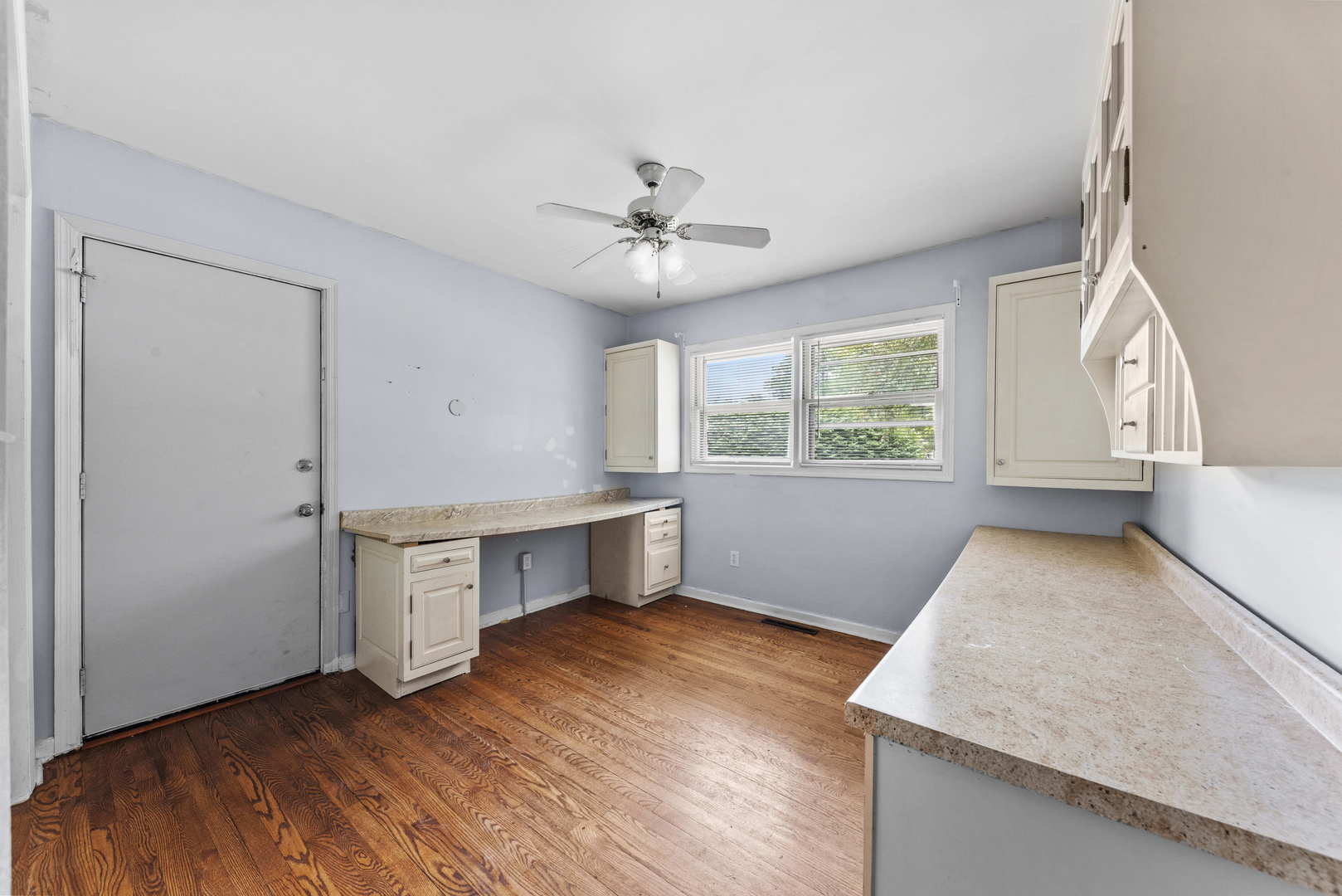 2 Baker Street Kankakee, IL 60901 - Photo 16 of 17 wooden floor in an empty room with a window