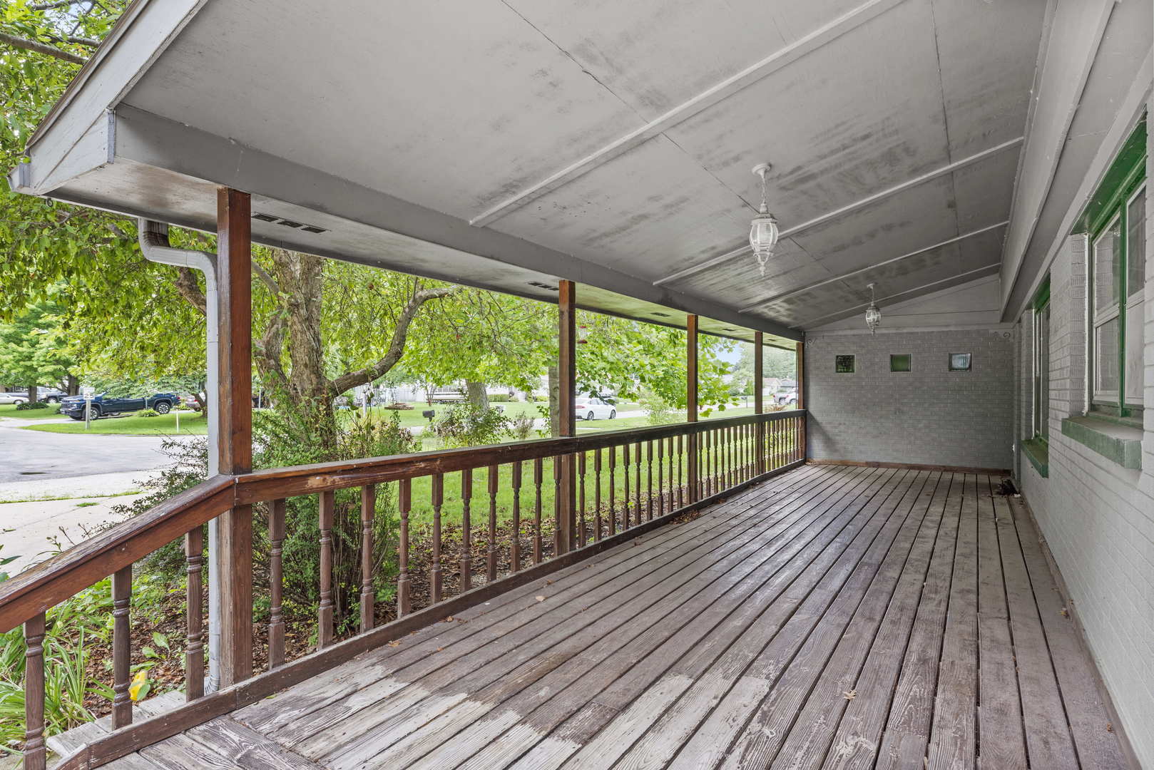 2 Baker Street Kankakee, IL 60901 - Photo 3 of 17 a view of porch with wooden floor in outdoor space