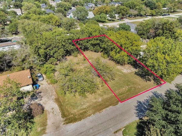 a view of a lake with a yard