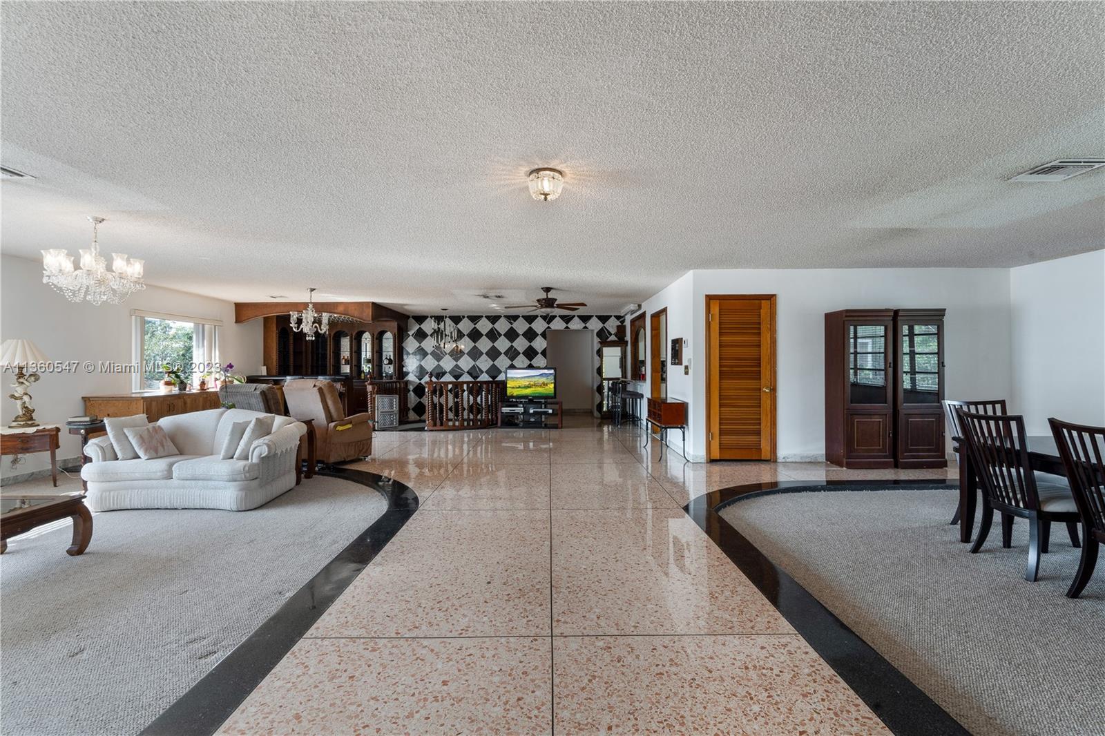 30 Southwest 21st Road Miami, FL 33129 - Photo 11 of 30 a living room with furniture and wooden floor