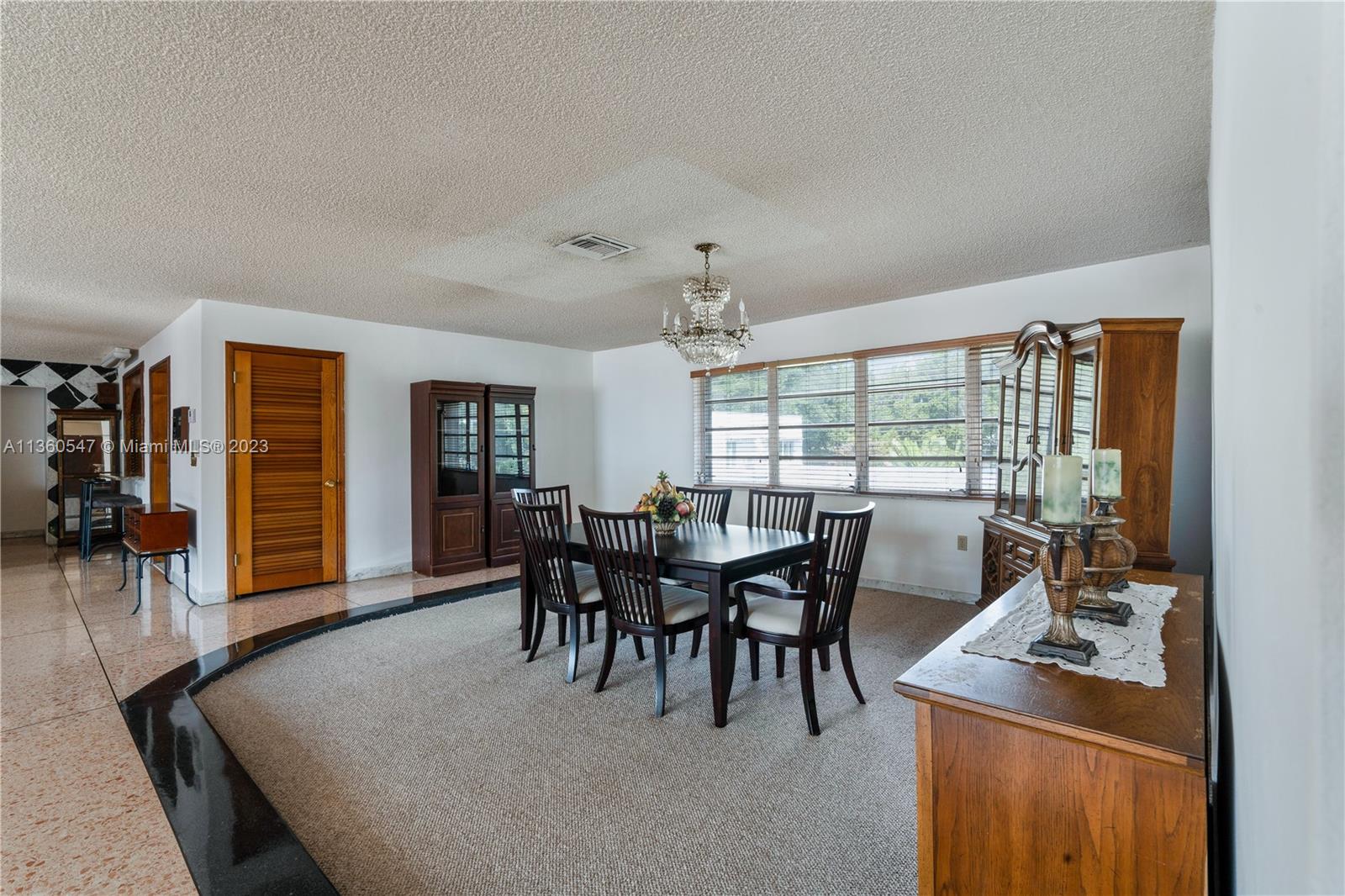 30 Southwest 21st Road Miami, FL 33129 - Photo 14 of 30 a view of a dining room with furniture window and outside view
