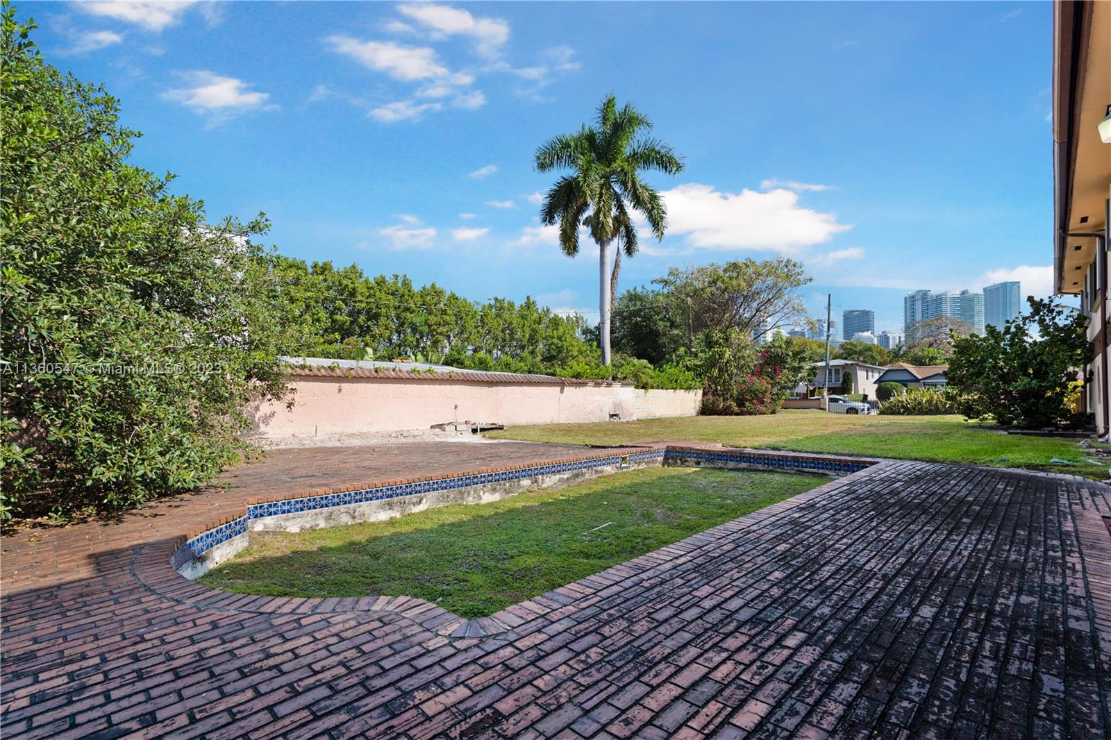 30 Southwest 21st Road Miami, FL 33129 - Photo 24 of 30 a view of a yard and entertaining space