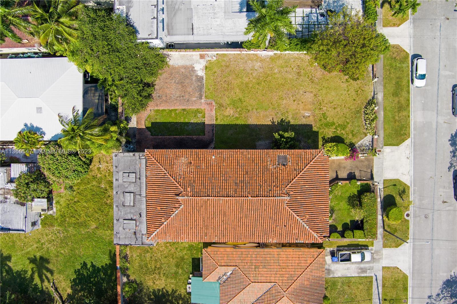 30 Southwest 21st Road Miami, FL 33129 - Photo 29 of 30 an aerial view of a house with a yard