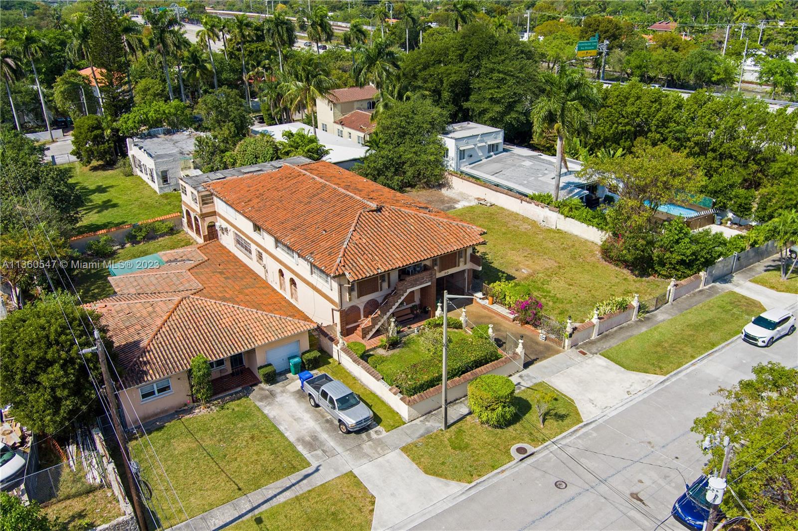 30 Southwest 21st Road Miami, FL 33129 - Photo 4 of 30 an aerial view of a house with a garden